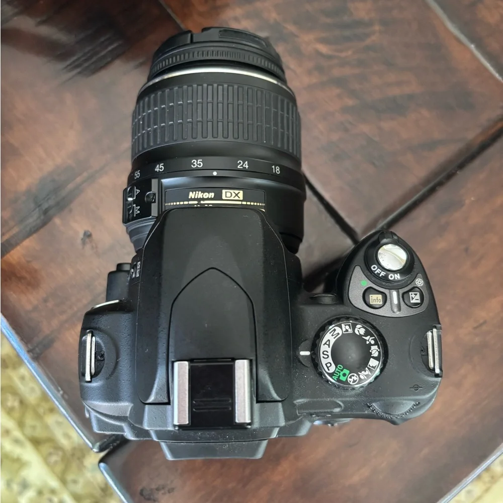 Nikon D40x with 18 - 55mm lens and full battery pack